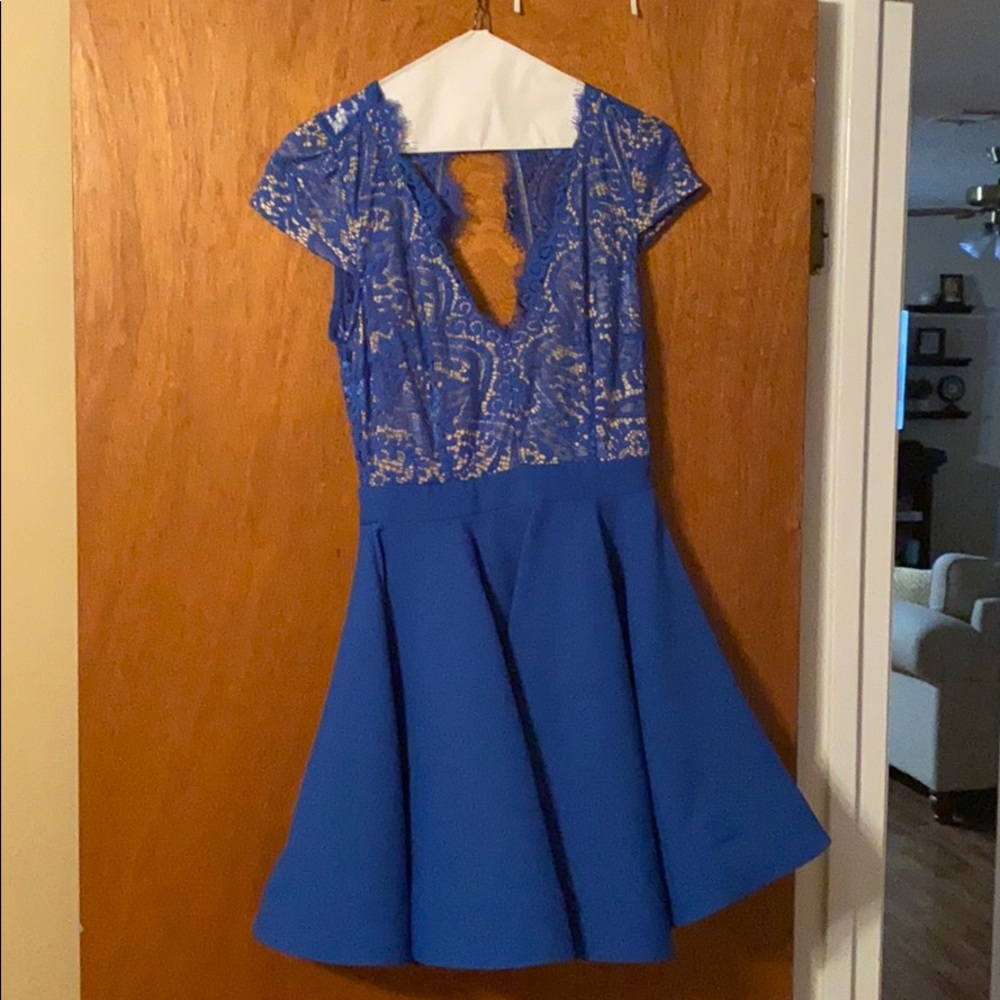 So gorgeous! Blue lace and ruffled skirt dress!